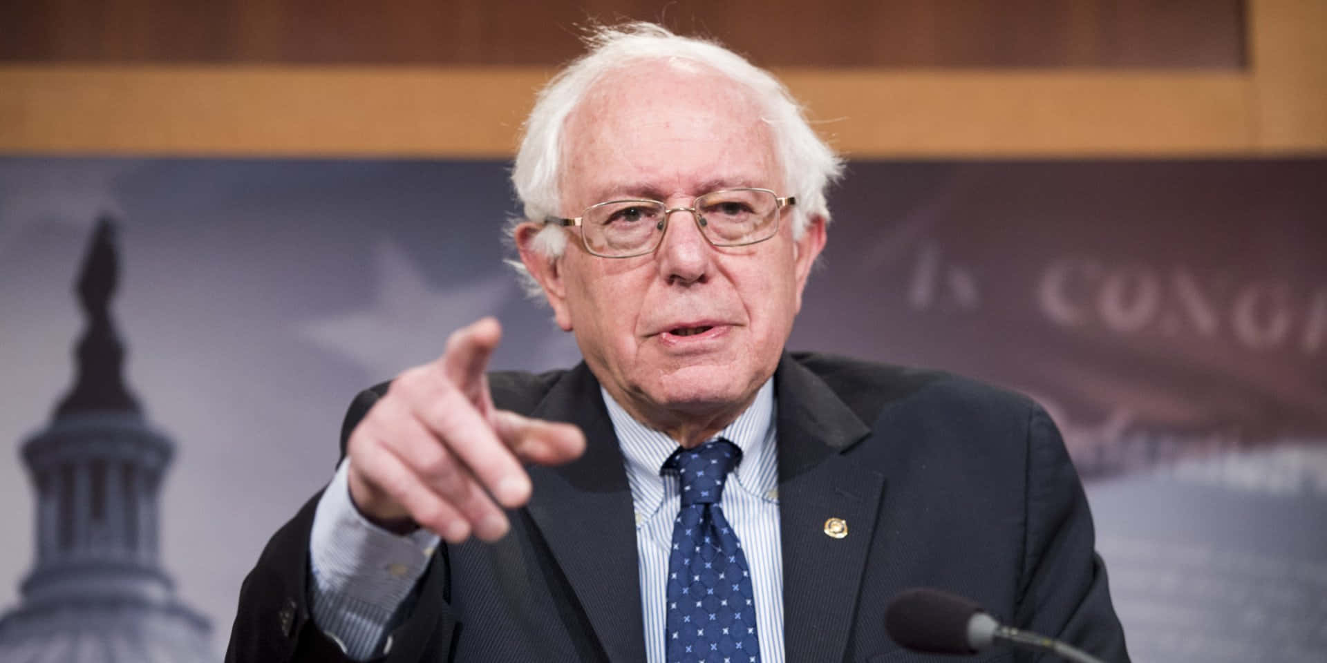 Bernie Sanders Pointing During Speech Wallpaper