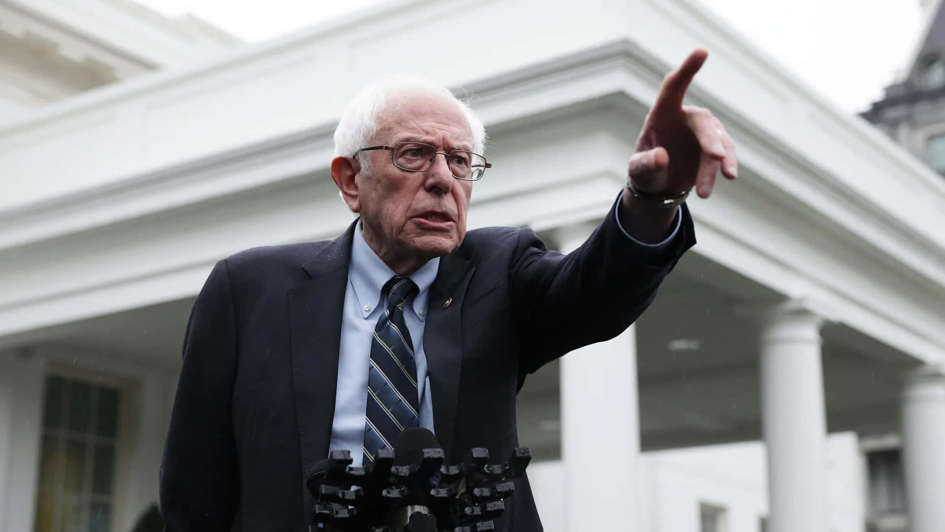 Bernie Sanders Speaking Outside White House Wallpaper