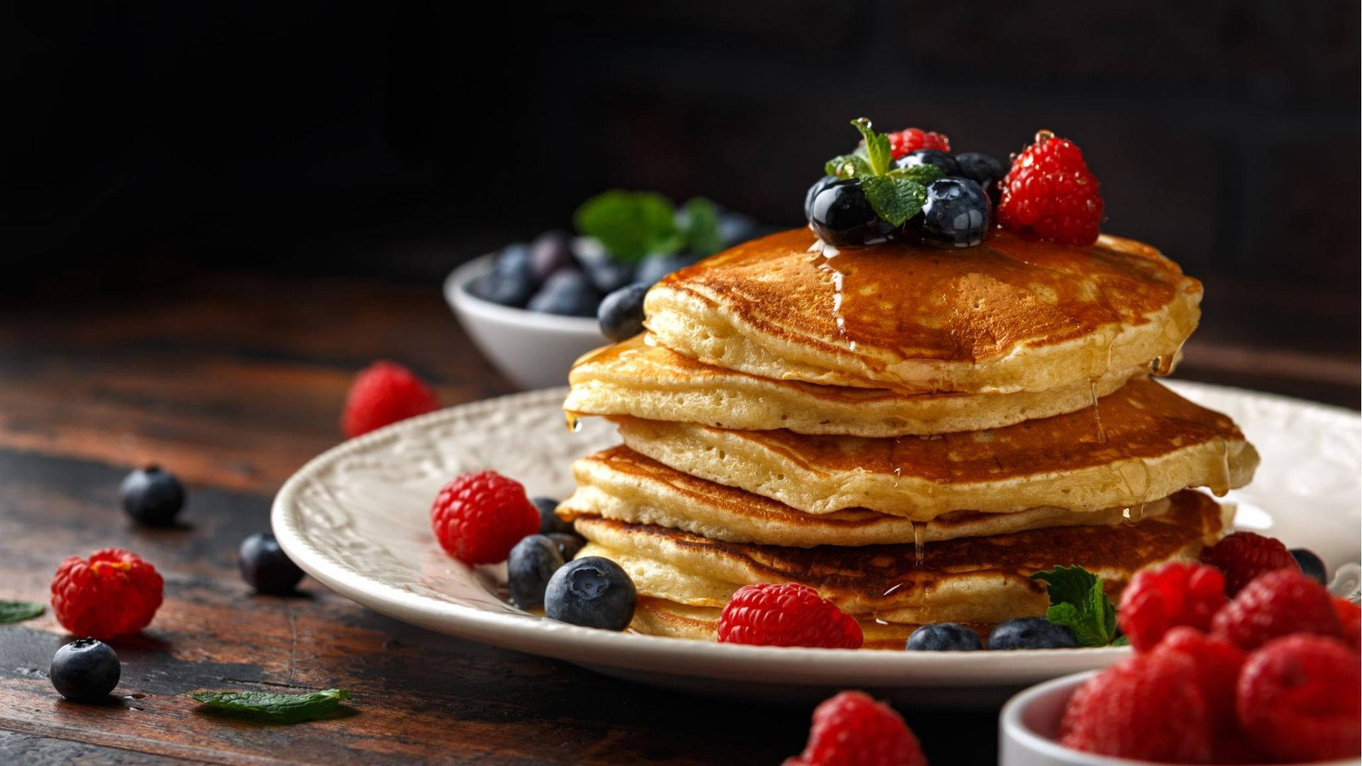 Berries And Honey On Pancakes