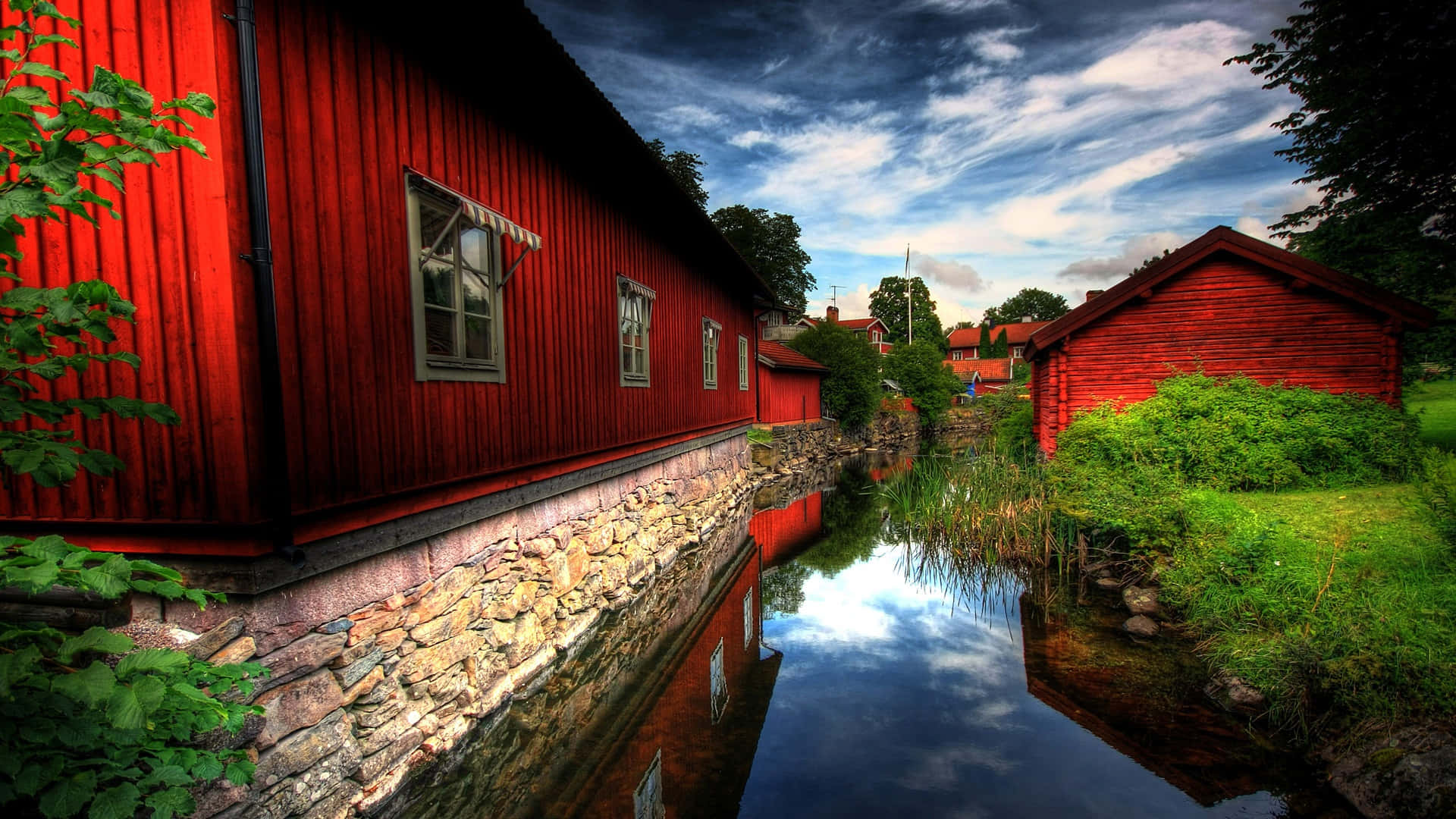 a red building with a stream