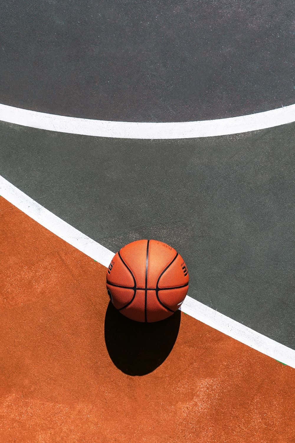 Bestesbasketball-hintergrundbild Mit Orangem Ball