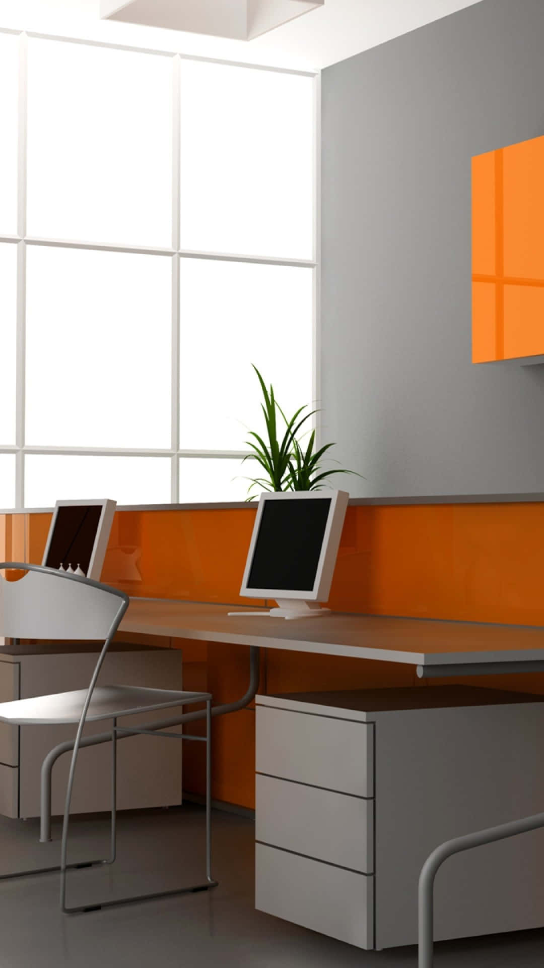 En orange og hvid kontor med et skrivebord og computer.