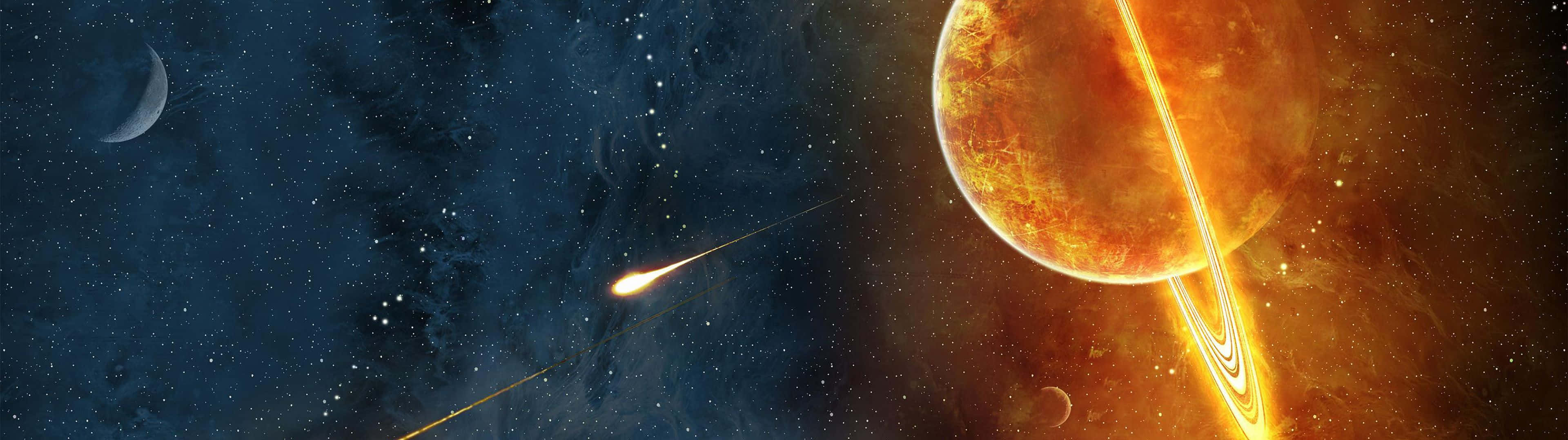 Bästadual Screen- Tapet Med Ett Flammande Saturnus. Wallpaper