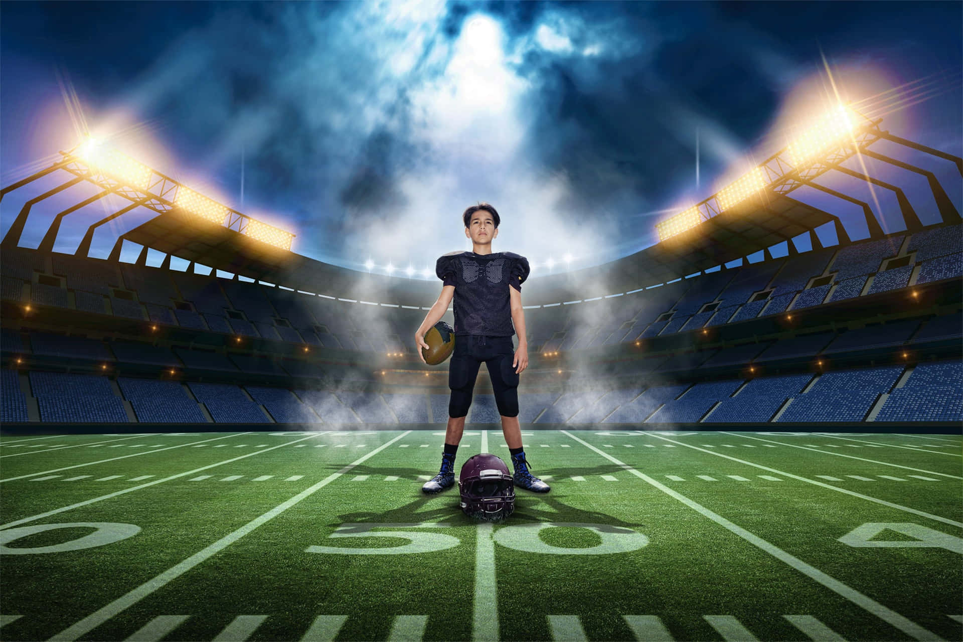 Boy Standing Inside A Field Best Football Background