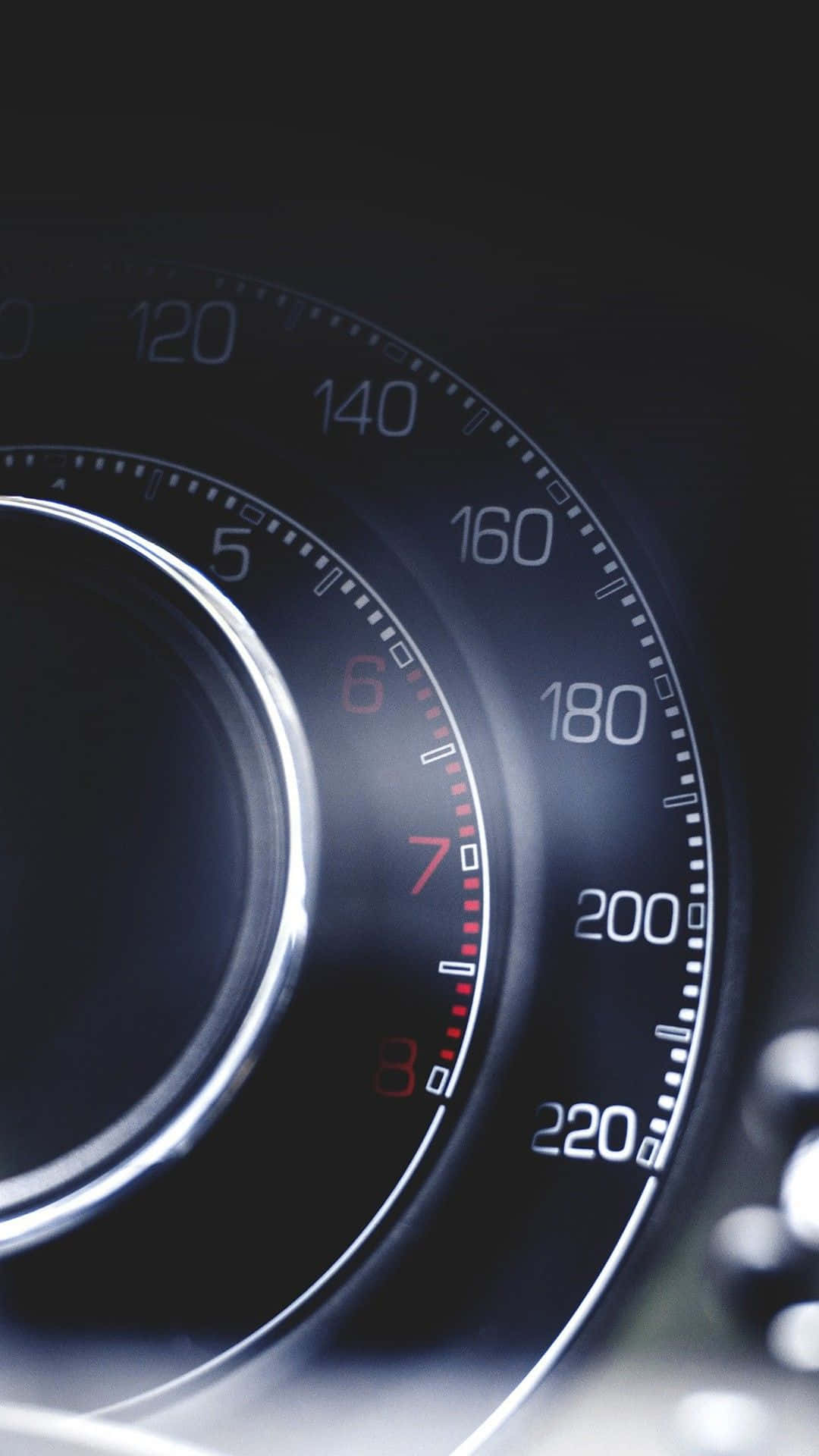 A Close Up Of A Speedometer