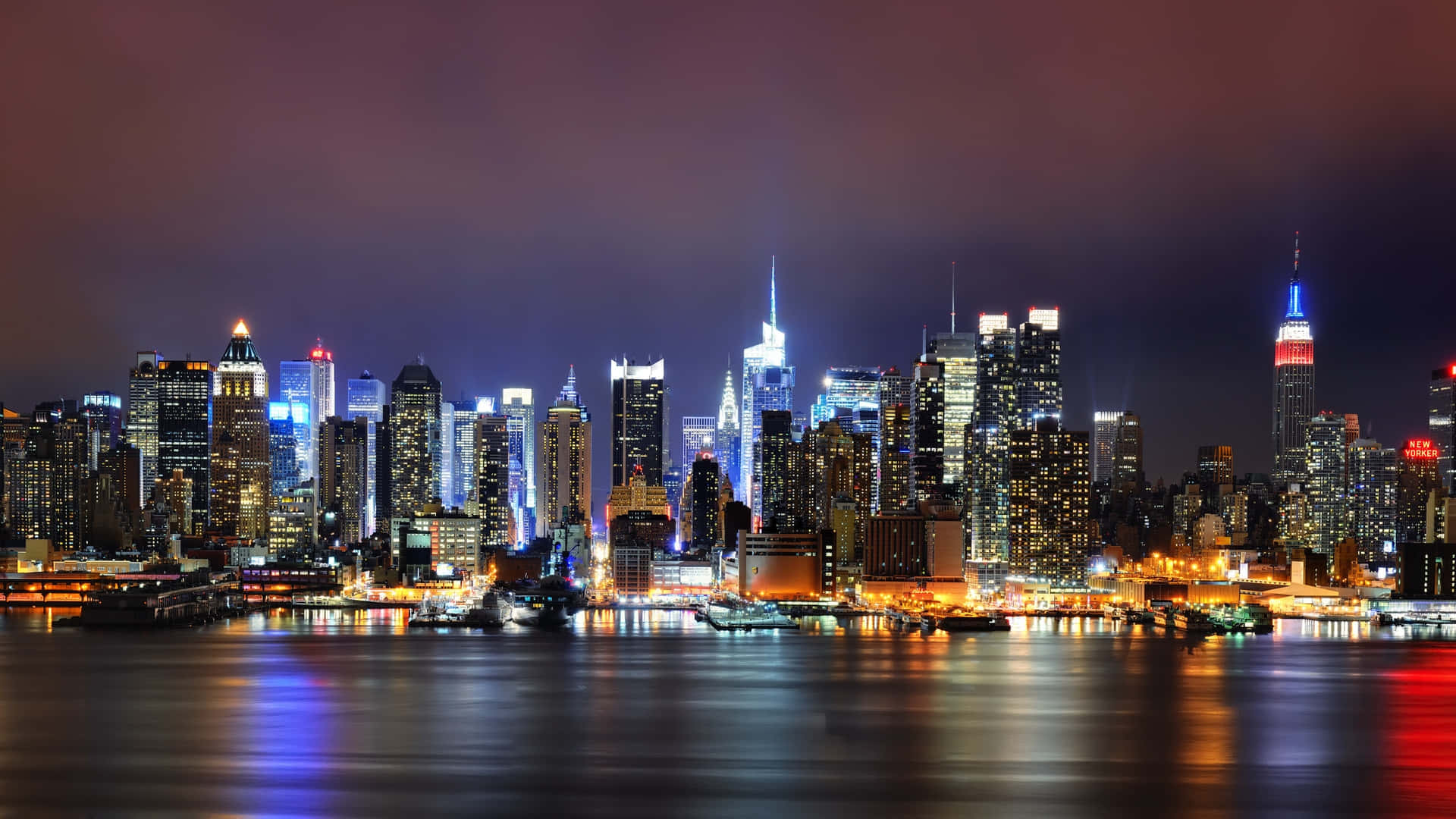 Sfondomigliore Con Luci Della Città E Del Molo Di New York.