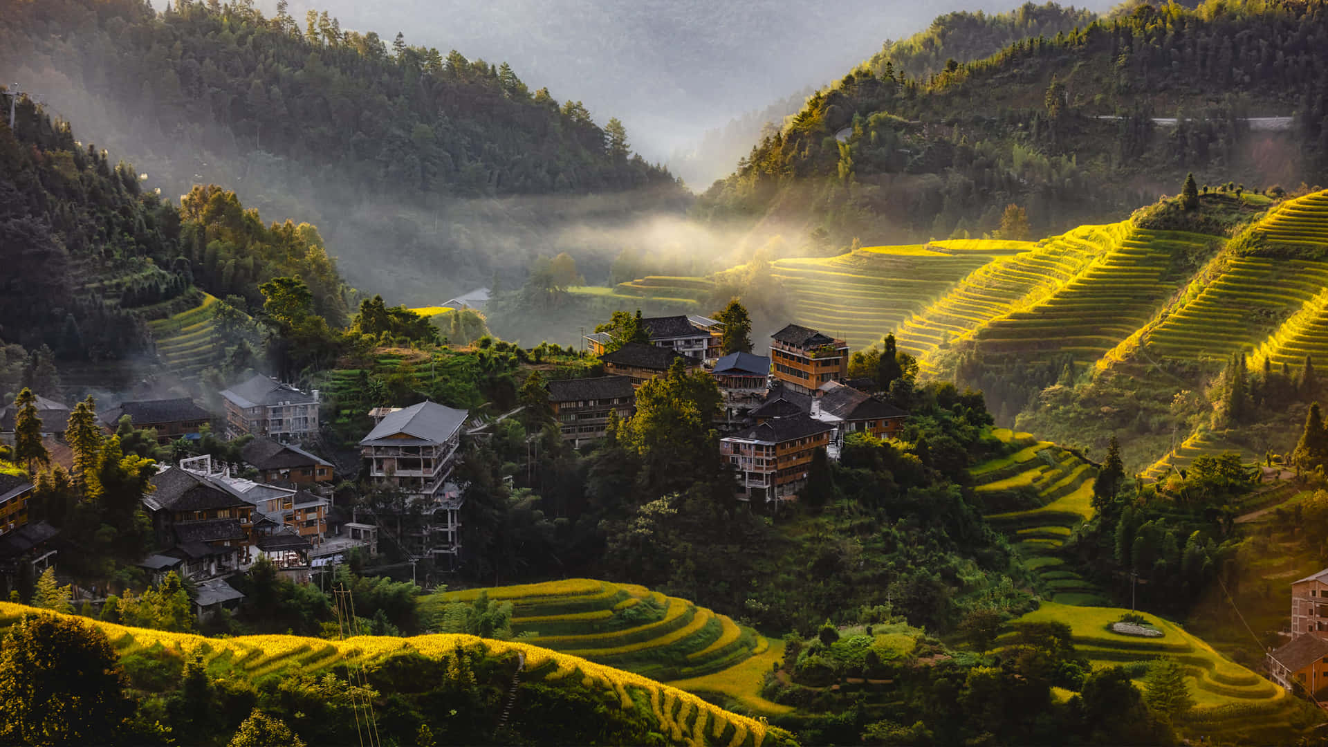 A Village With Rice Terraces In The Mountains