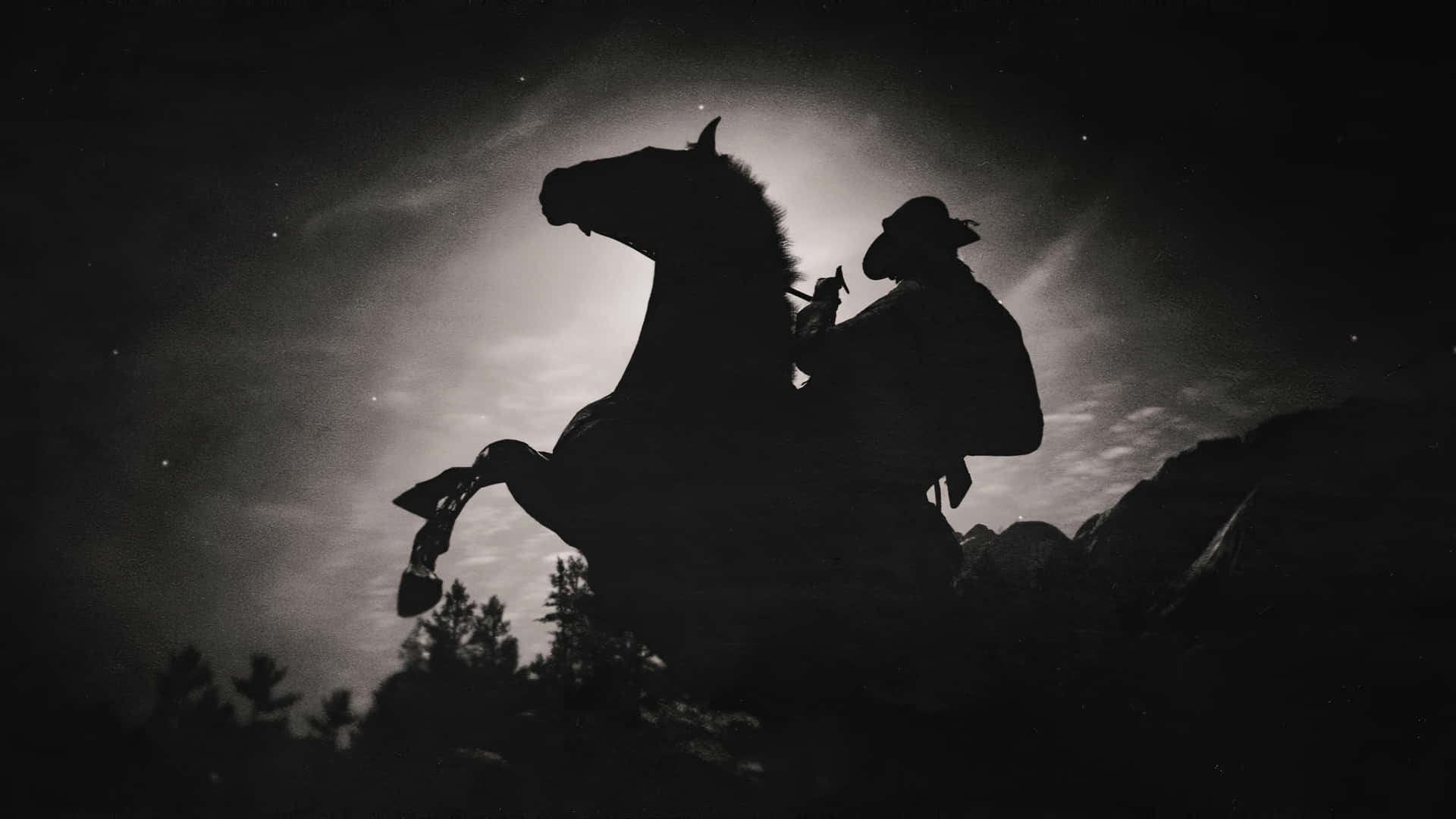 Bästabakgrundsbilden Till Datorn Eller Mobilen: Svartvit Bild På En Cowboy Från Red Dead Redemption 2.