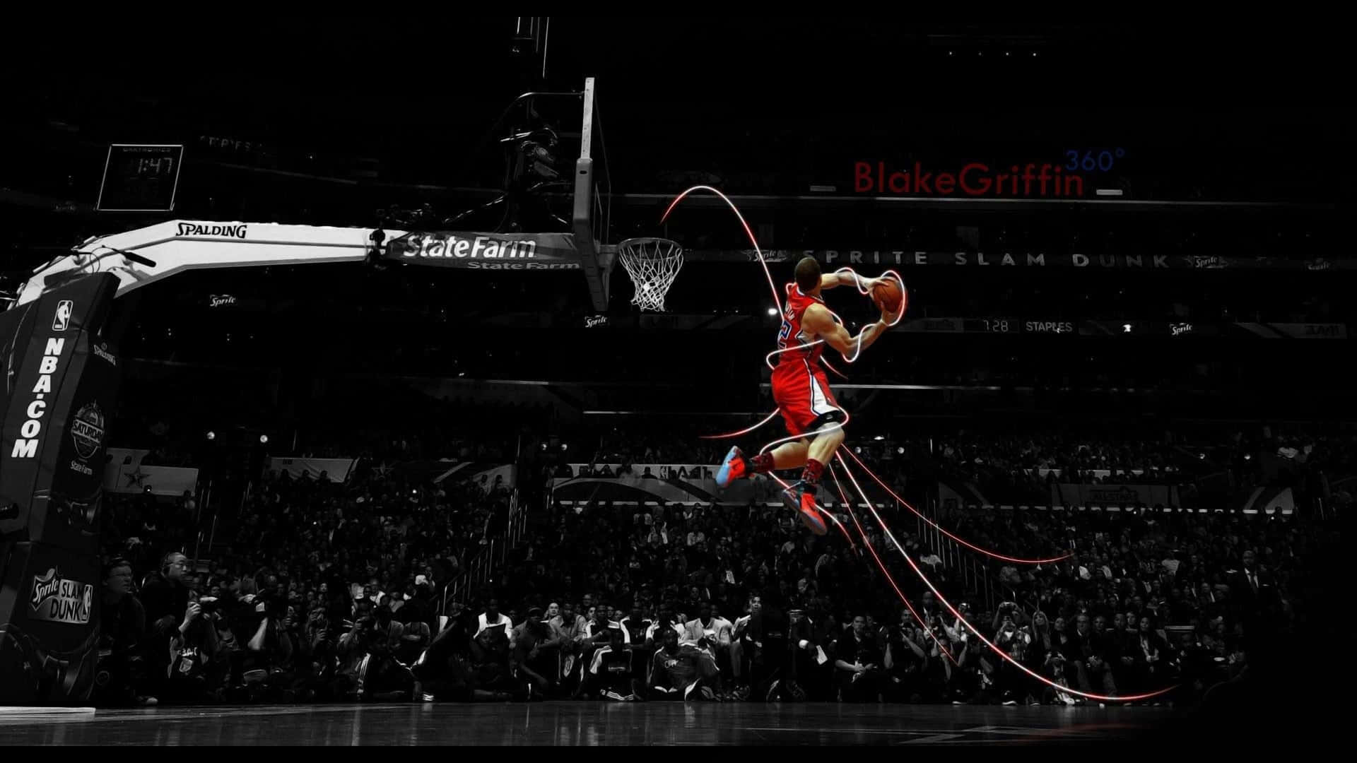 A Basketball Player Is Dunking The Ball In The Air Wallpaper