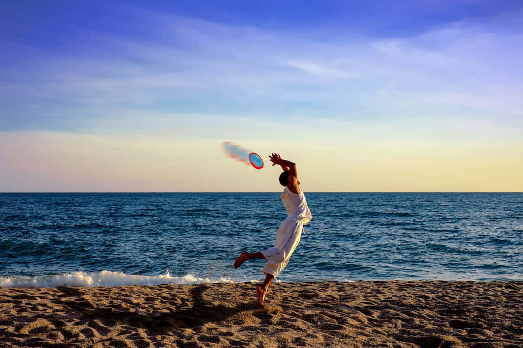 Sfondoestetico Sulla Spiaggia Per Il Migliore Ultimate Frisbee.