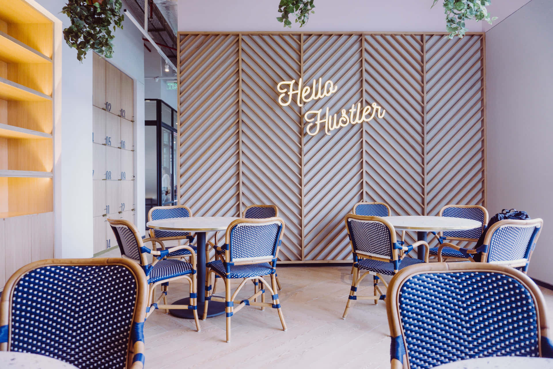 A Cafe With Blue Chairs And A Sign That Says Hello Flutter