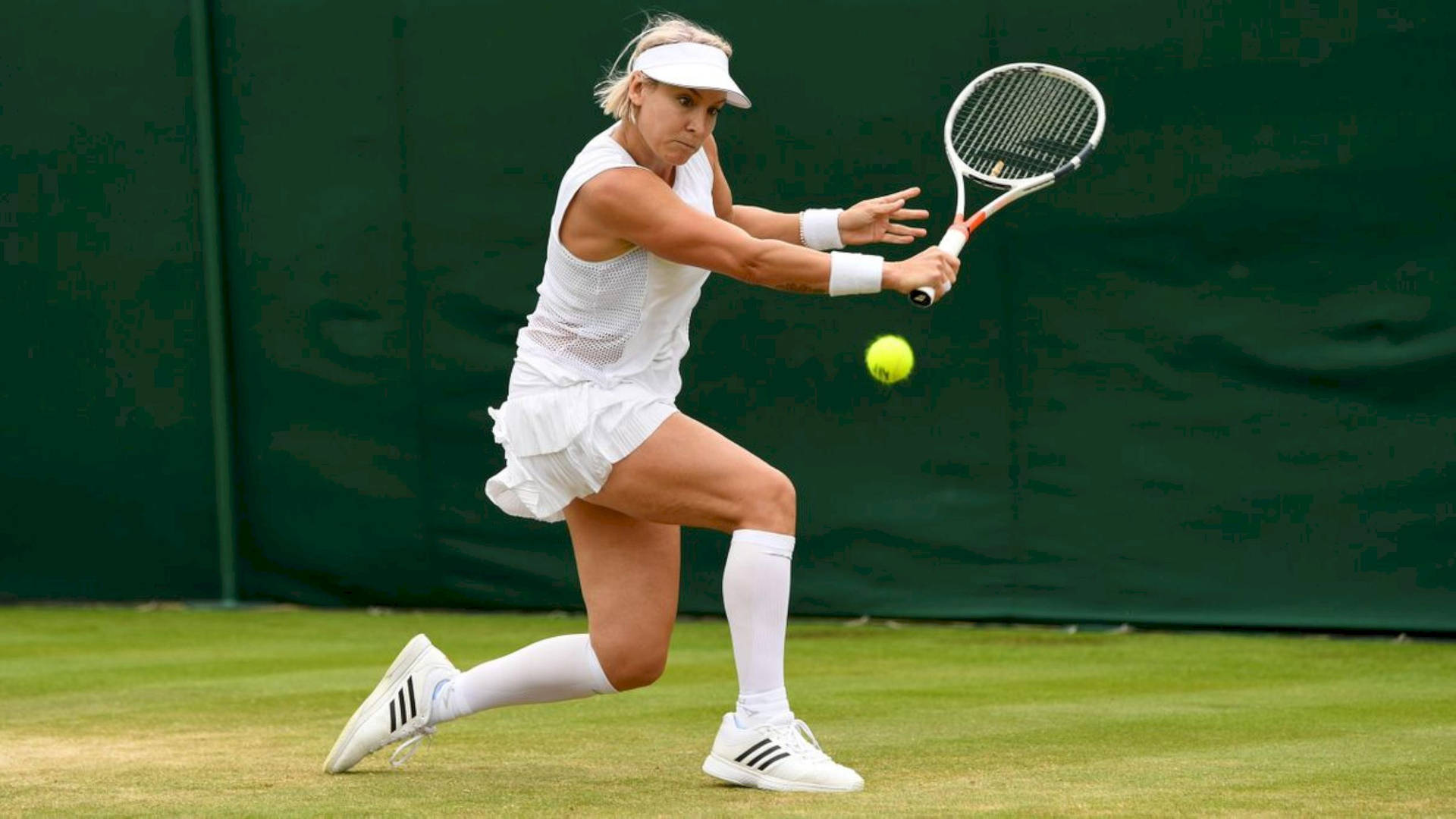 Bethanie Mattek-sands Catching Tennis Ball Wallpaper