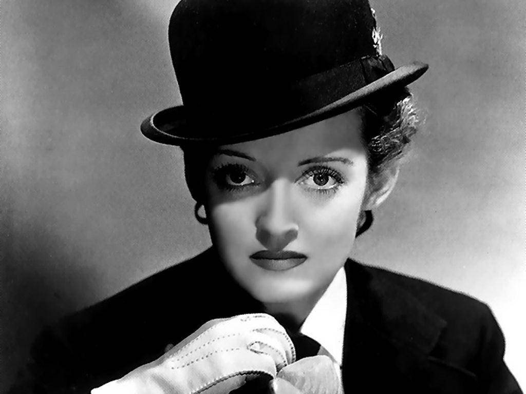 Bette Davis Wearing Bowler Hat Wallpaper