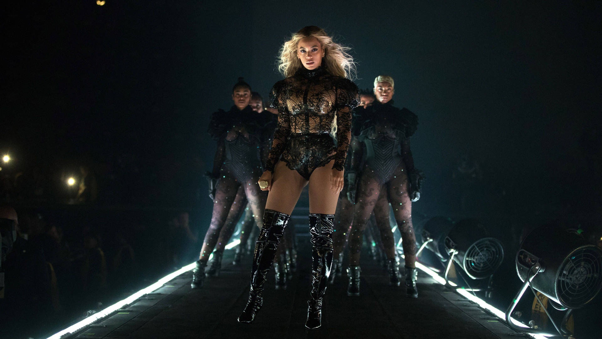 Beyonce And Her Dancers In Black Background
