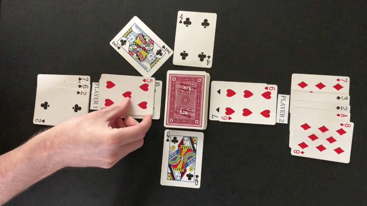 A classic game of Bezique with 5 heart card Wallpaper