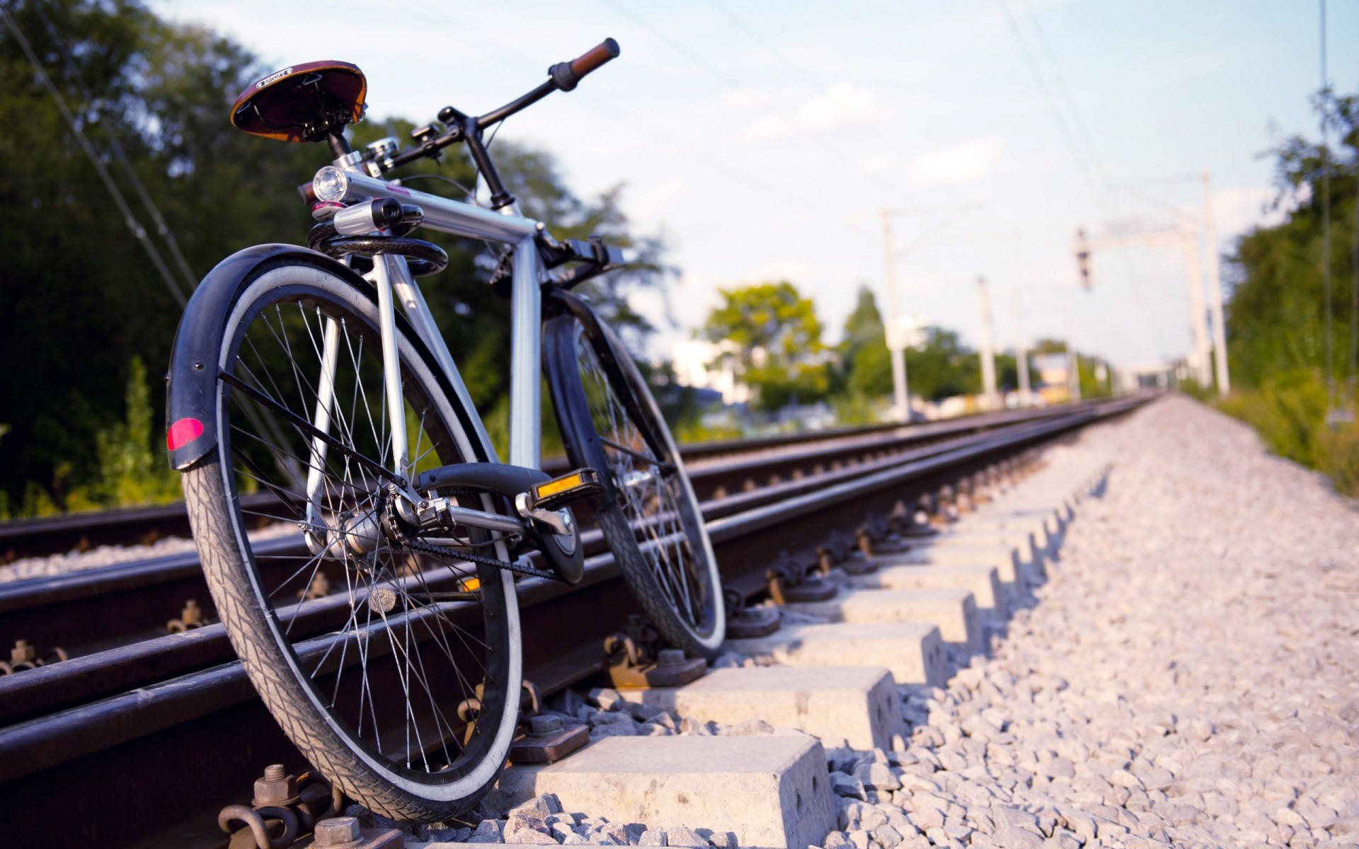 Bicycle By The Train Tracks Background