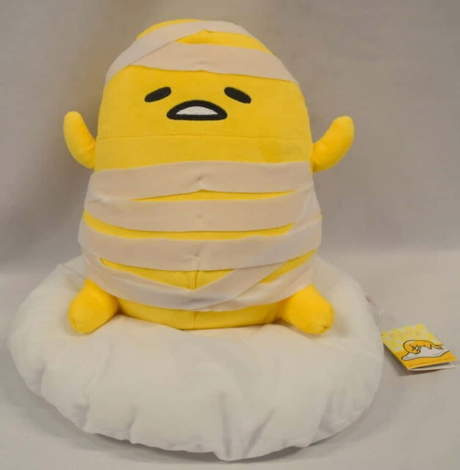 A Giant Gudetama Sitting Relaxedly Wallpaper