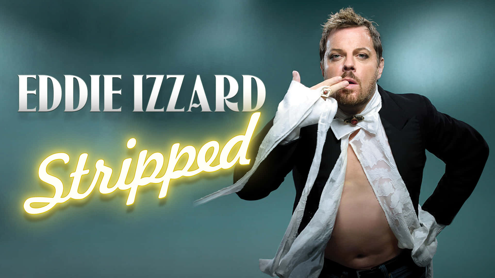 Bijschrift: Eddie Izzard Op Het Podium Tijdens Een Live Optreden Achtergrond