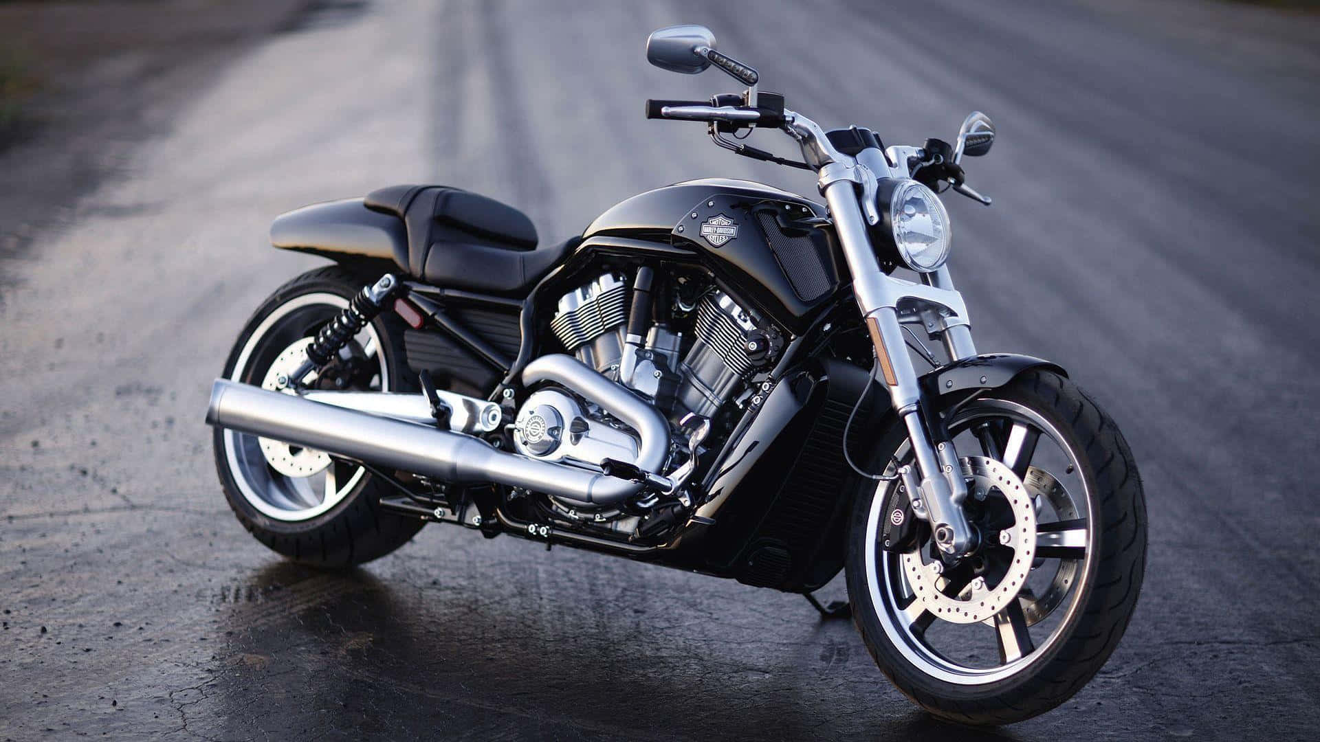 Häftigbakgrund Med Harley Davidson Vrsc-motorcykel