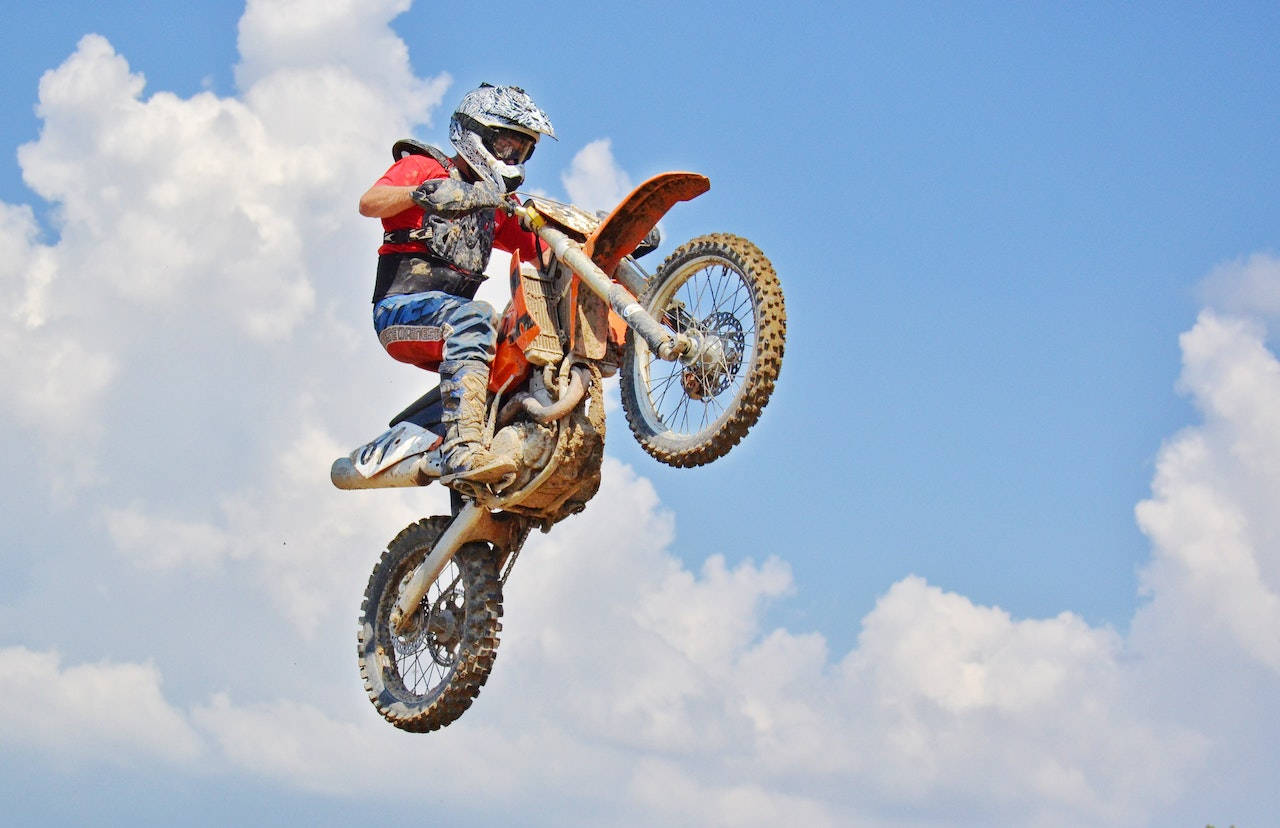 Bike Rider Doing A Stunt Picture