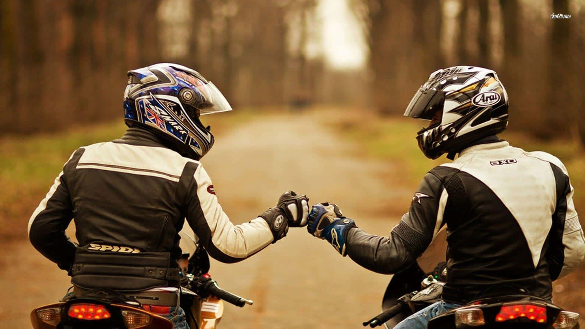 Fist Bumping Biker Pictures