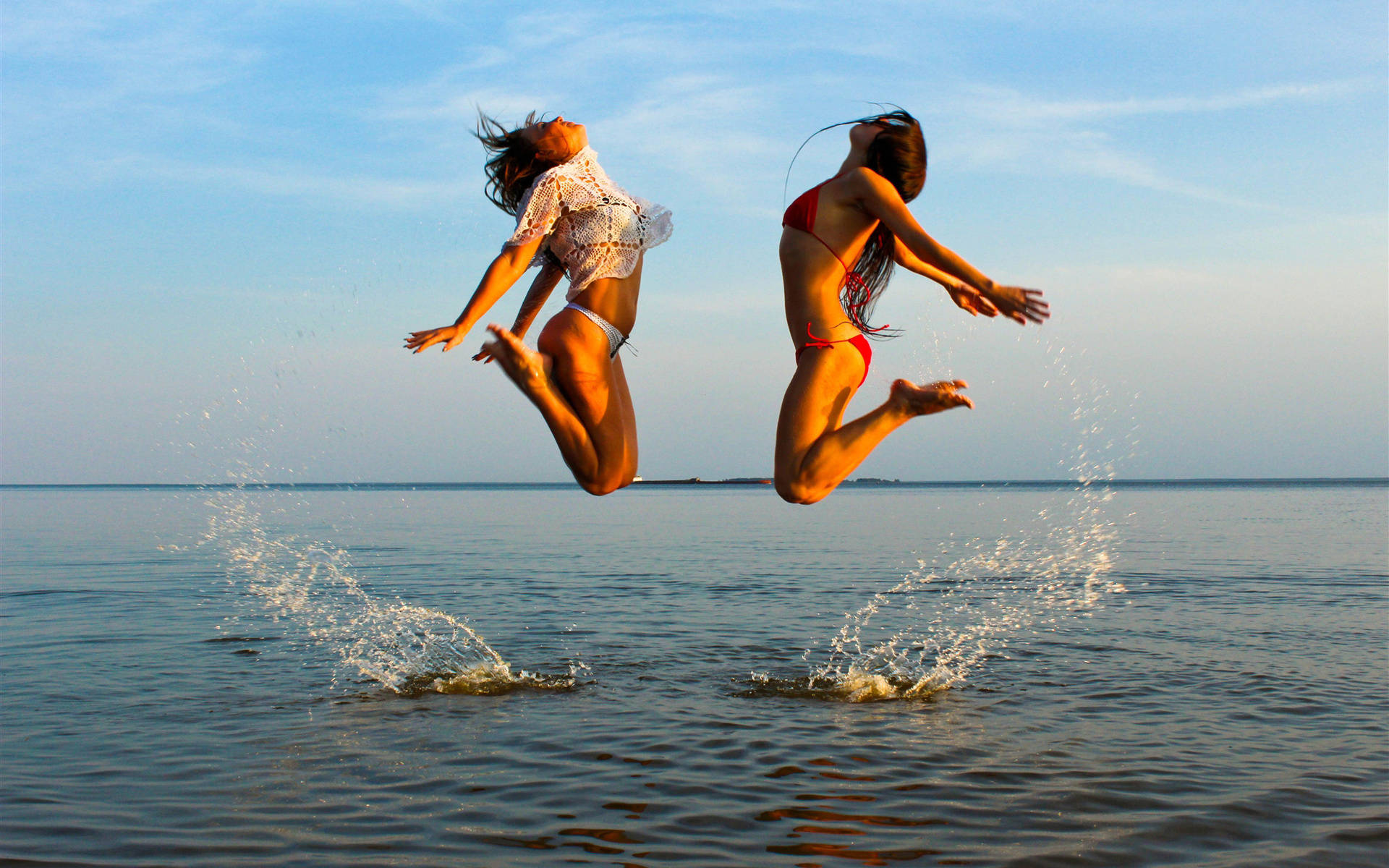 Bikini Girl Jumping On Sea Picture
