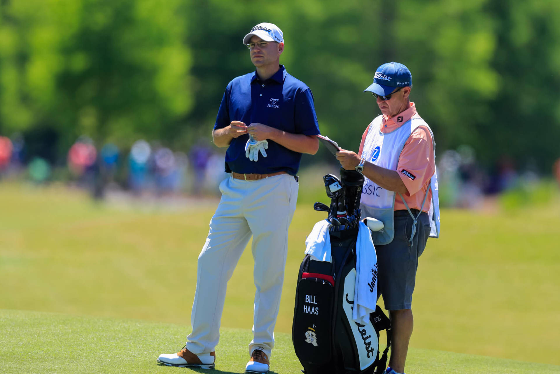 Bill Haas Standing With His Caddie Wallpaper