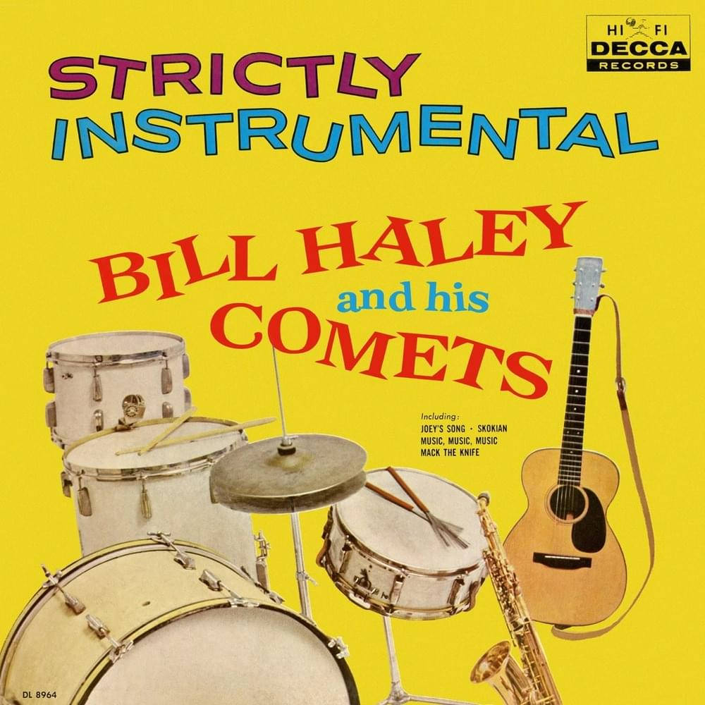 Legendary Bill Haley And The Comets posing with their instruments and an album. Wallpaper