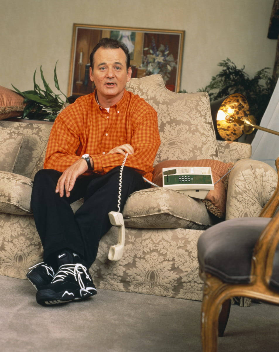 Bill Murray sidde på sofa Hjemskade Telefon Wallpaper