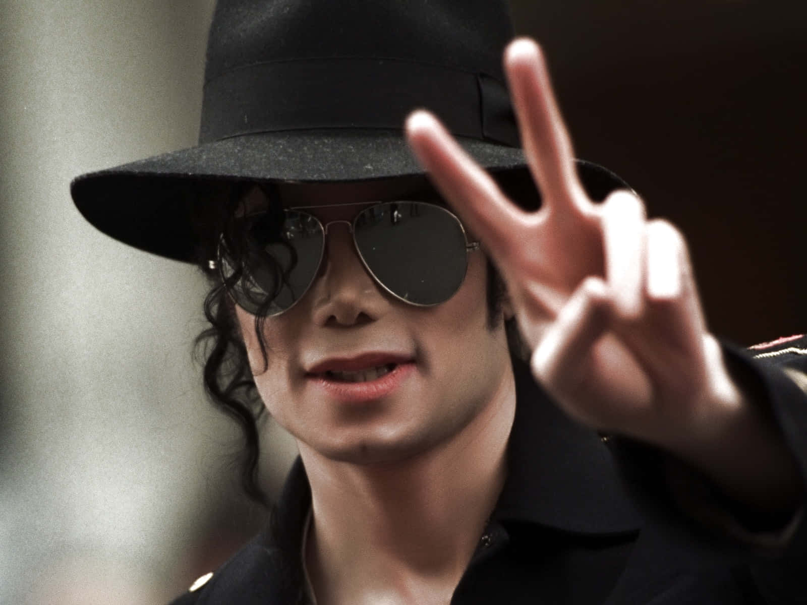 Michael Jackson billeder springer til liv på din skærm.