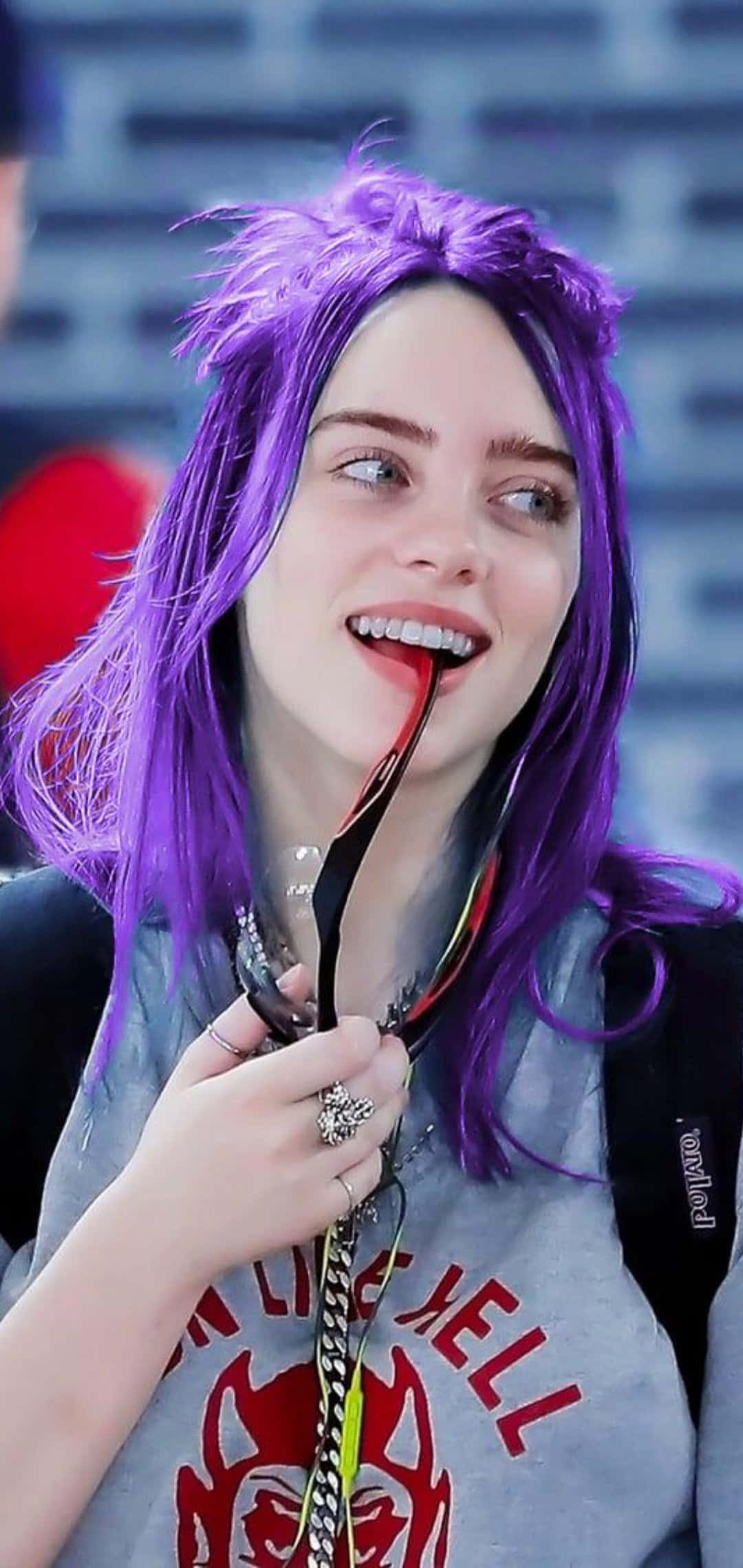 Billie Eilish gracing the stage with her signature style and powerhouse vocals