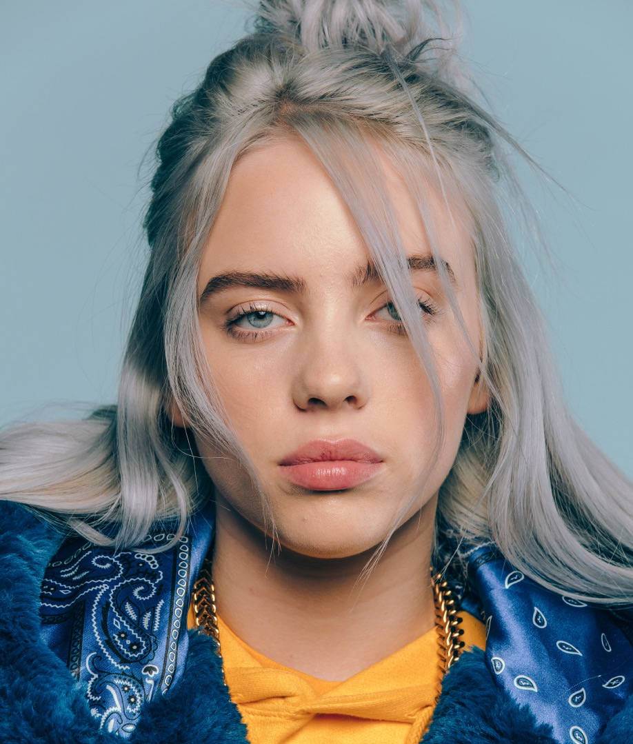 Singer-songwriter Billie Eilish posing with a black and white filter Wallpaper