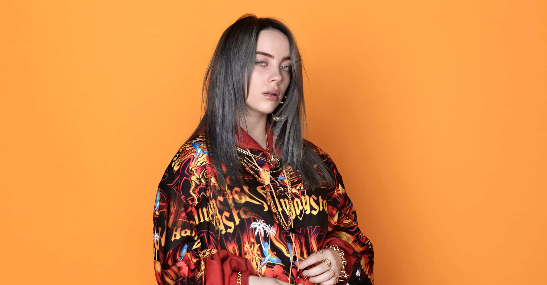 "Billie Eilish on the go with her laptop" Wallpaper