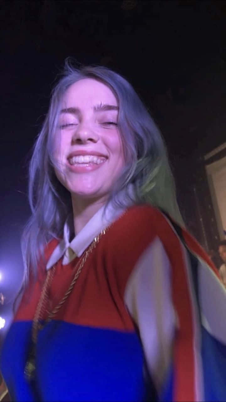 Billie Eilish Is Ready To Share Her Signature Smile Wallpaper