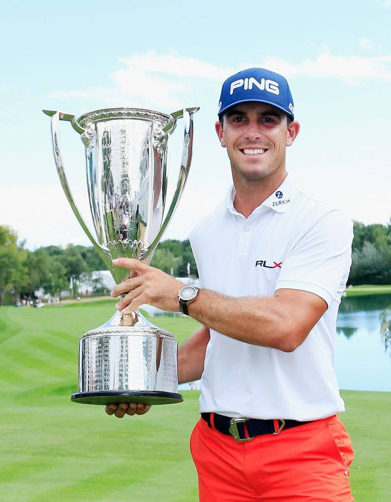 Billy Horschel Celebrating Victory With Silver Trophy Wallpaper