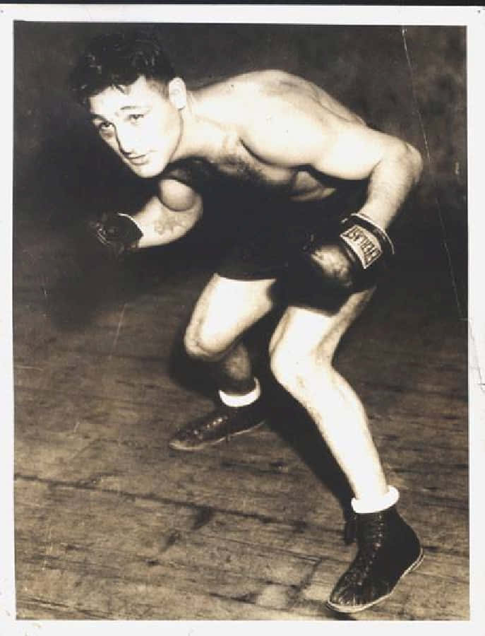 Billy Petrolle Wearing Boxing Shorts And Gloves Wallpaper
