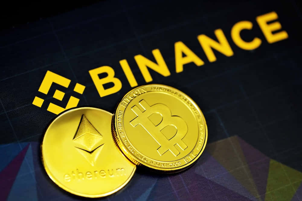 A Gold Coin And A Bitcoin Logo