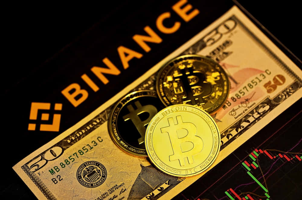 Bitcoin And Gold Coins On A Black Background