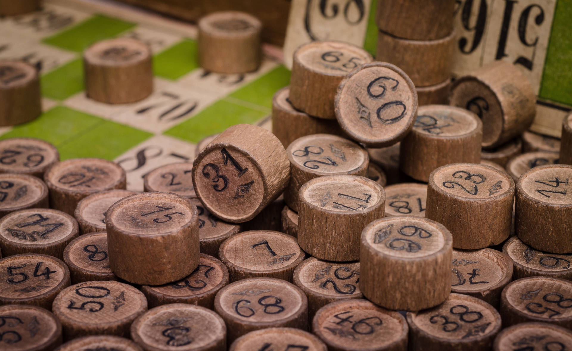 A collection of wooden bingo chips Wallpaper