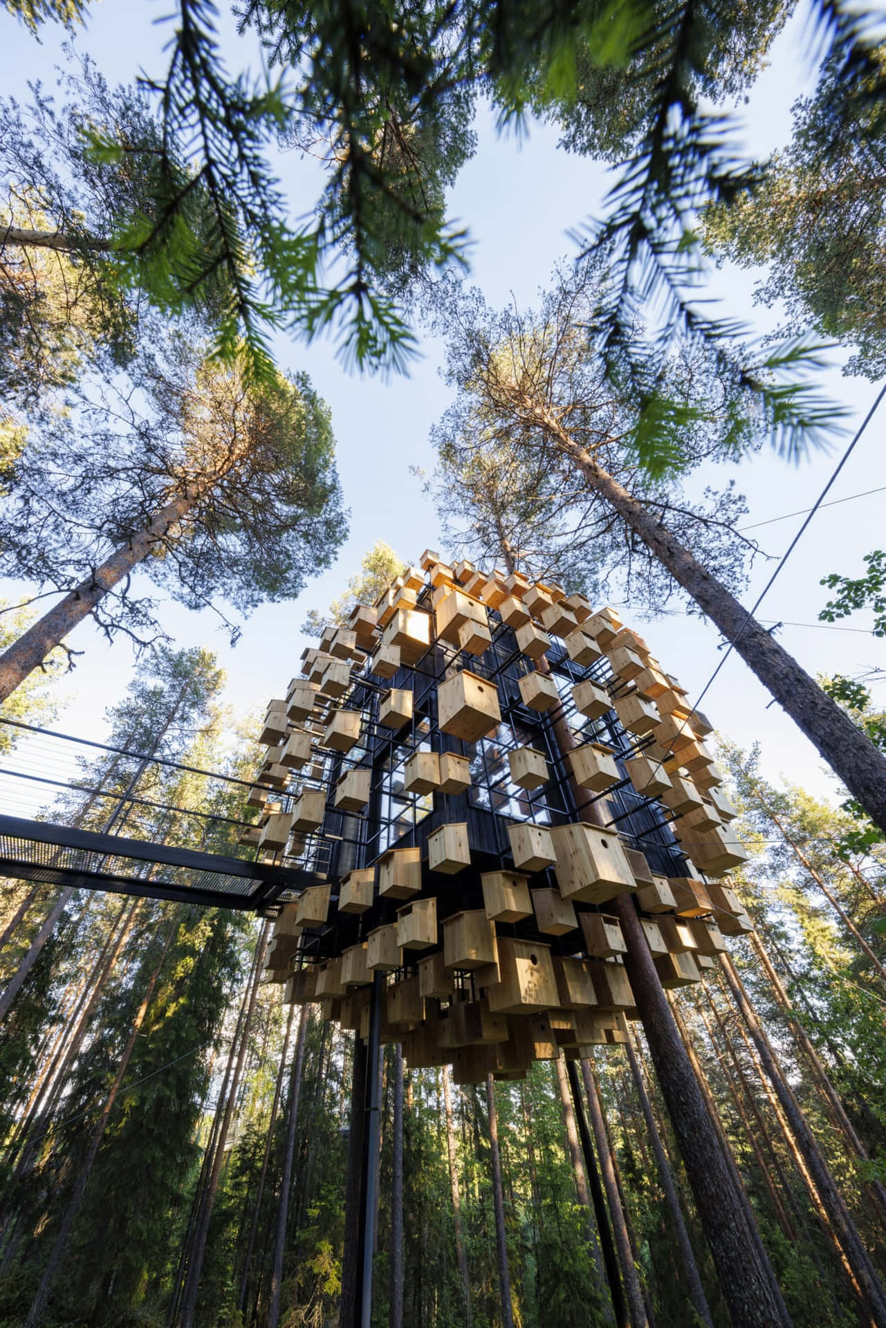 A Tree House Made Of Wooden Blocks In The Forest