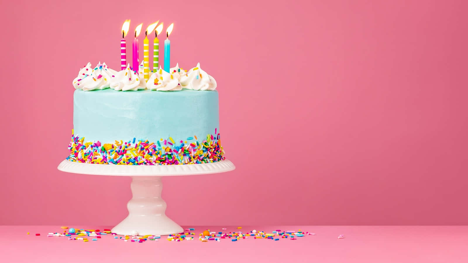 A Festive and Delicious Birthday Cake with Colorful Candles