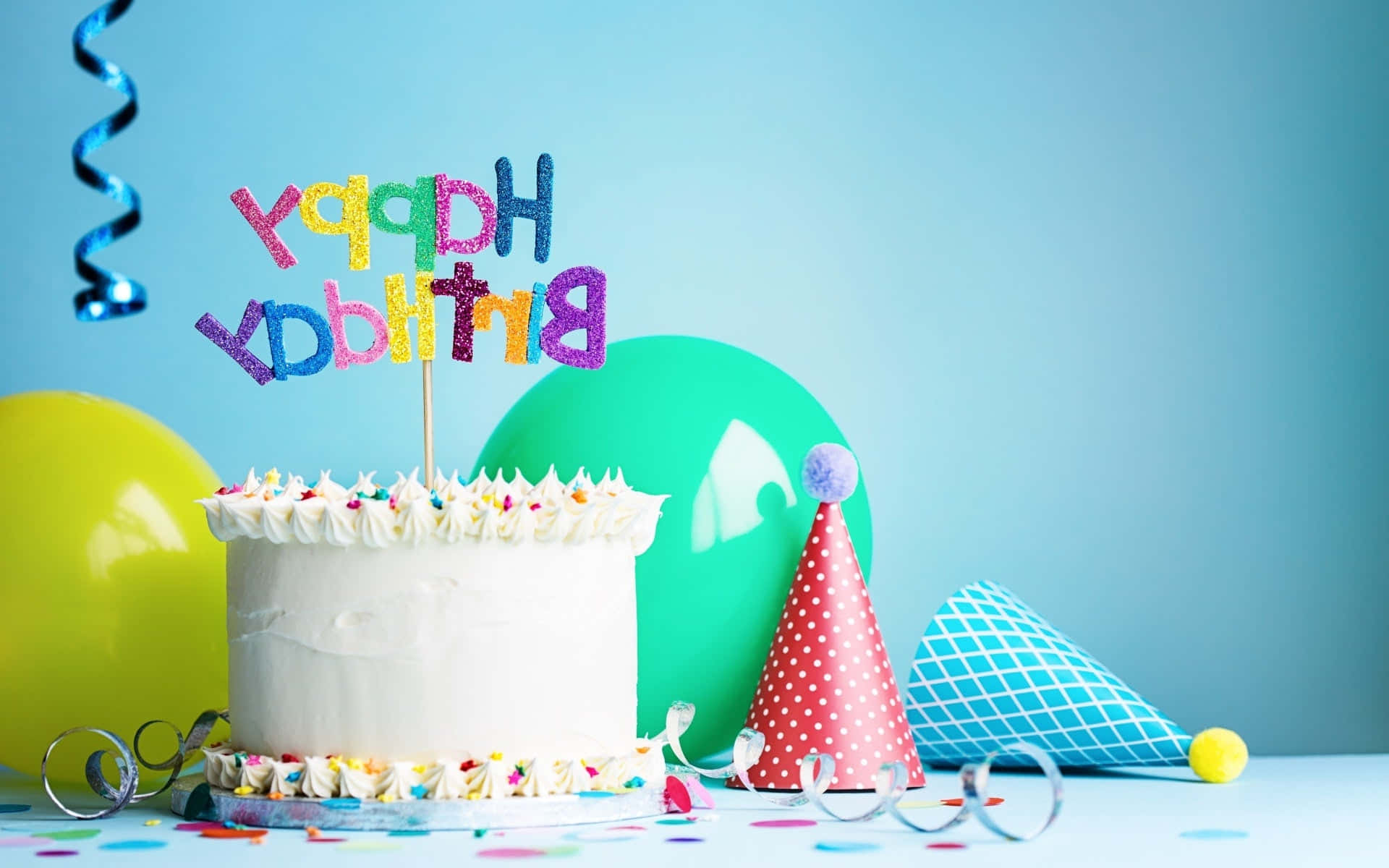 A colorful and delicious birthday cake on a bright table setting