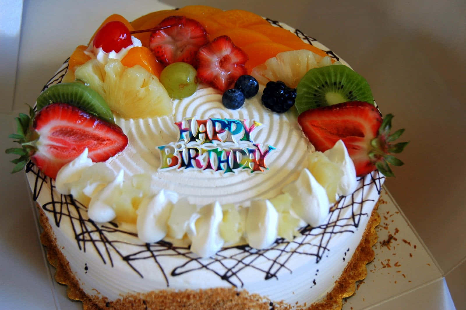 A Cake With Fruit On It