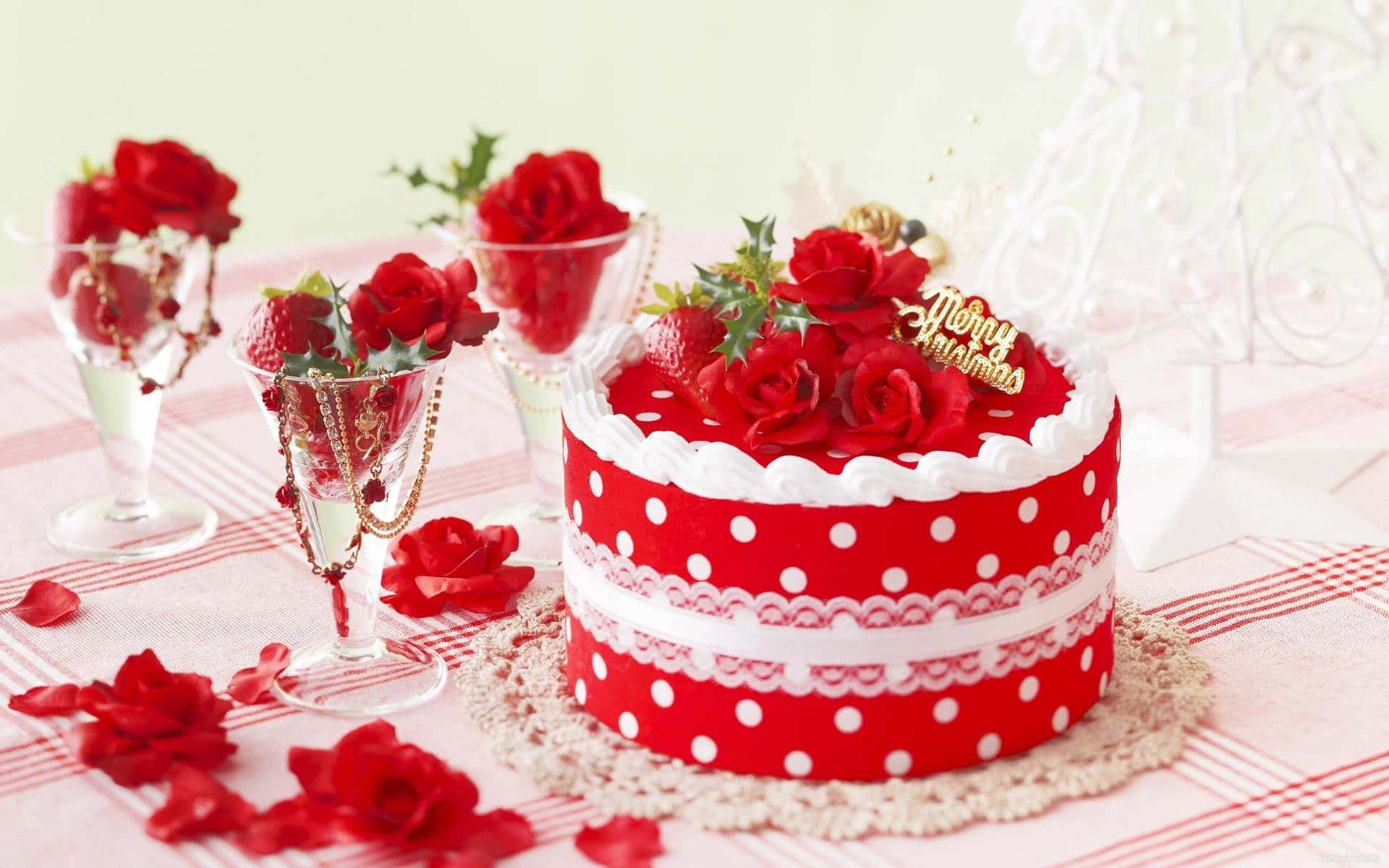 A Red Cake With Red Roses On Top