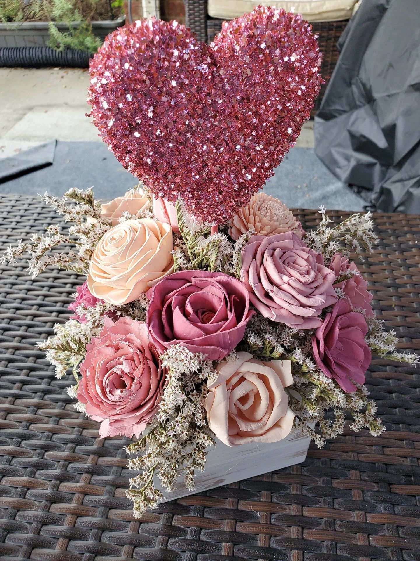 A Pink Heart Shaped Flower Arrangement