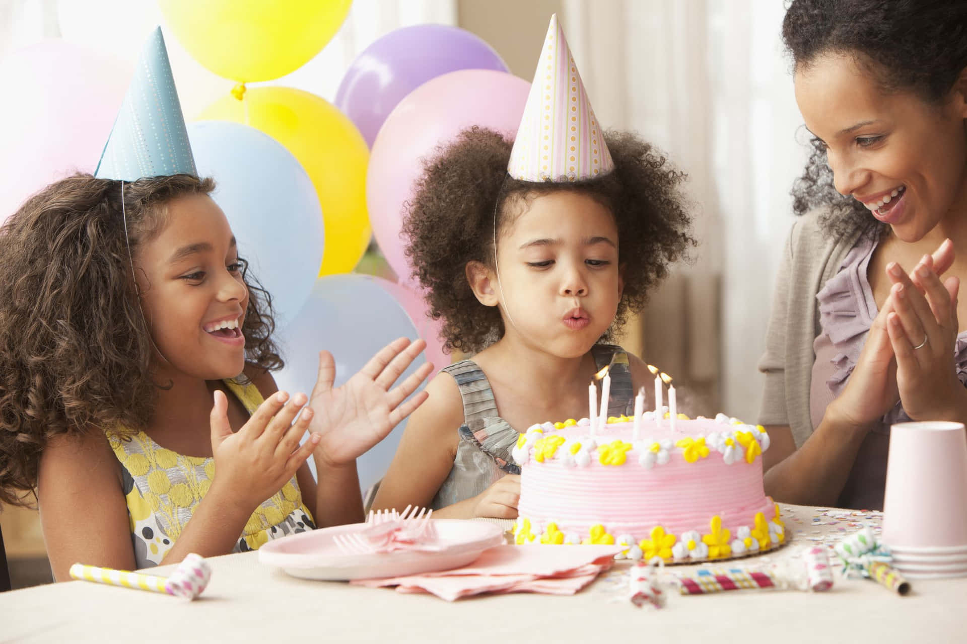 Birthday Party Child Blowing Candle On Cake Picture