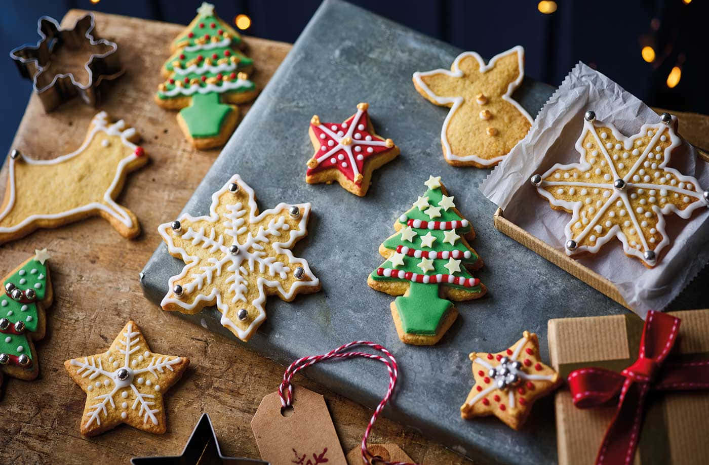 Christmas Cookies On A Table With Decorations