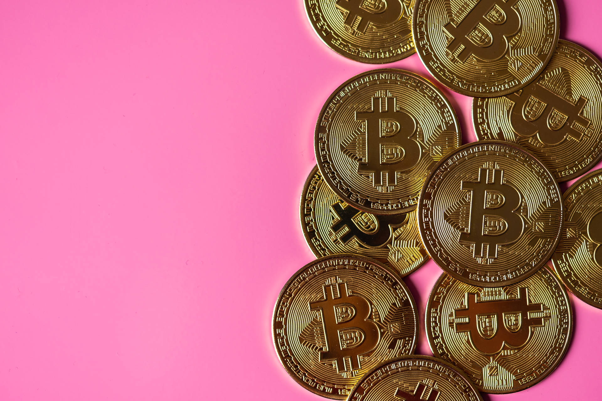 Bitcoin In Pastel Pink Color Background Wallpaper