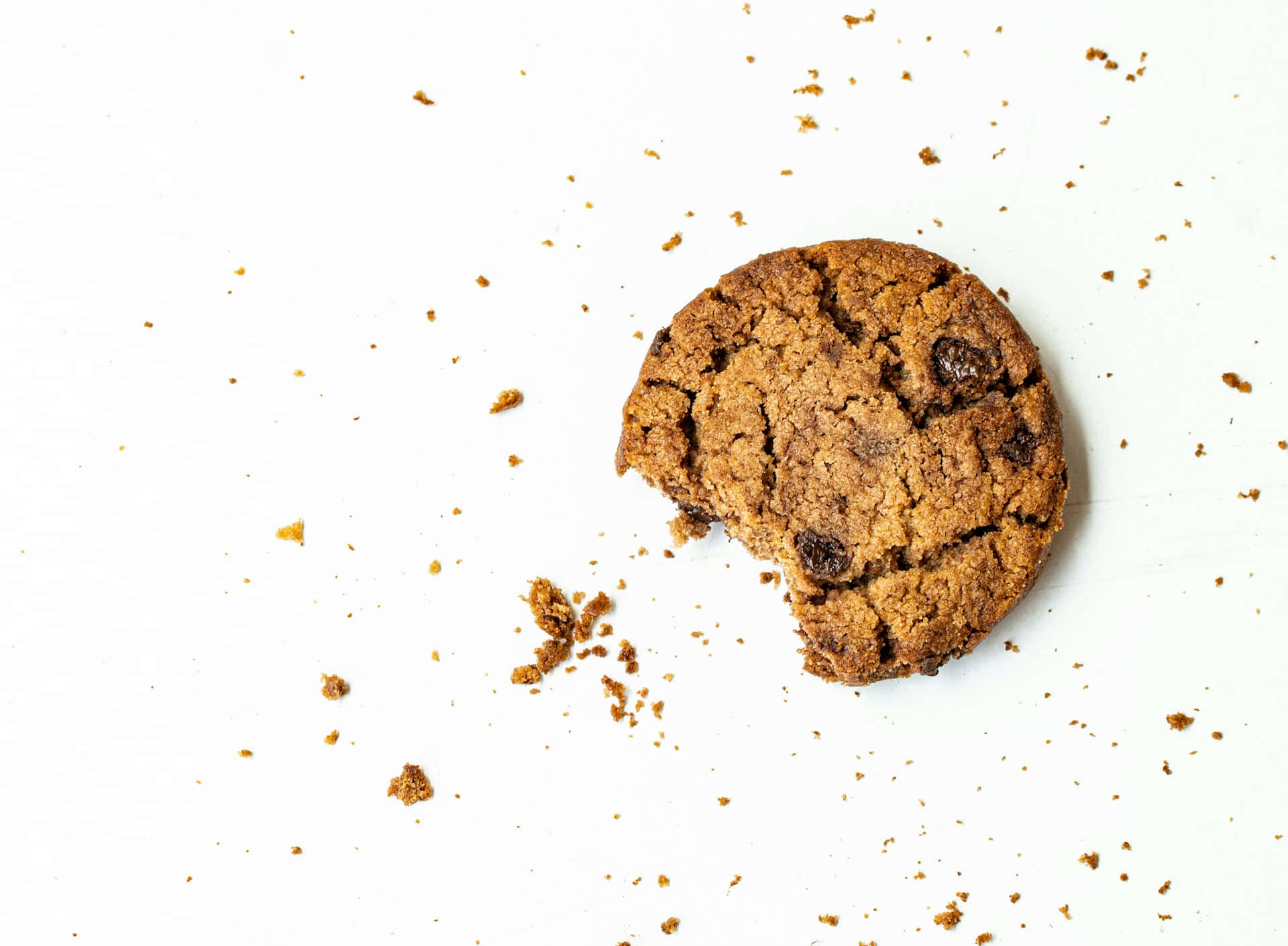 Bitten Chocolate Chip Cookie White Background.jpg Wallpaper