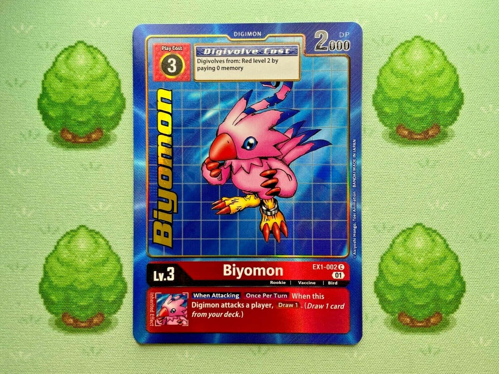 Biyomon - A Pink Bird Digimon Ready For Action Wallpaper